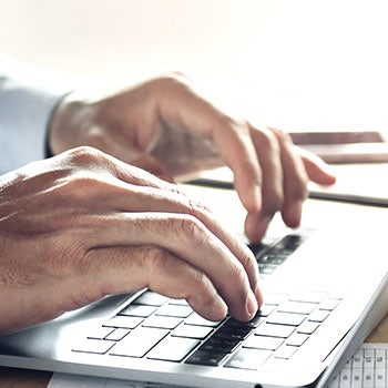 user typing in a computer