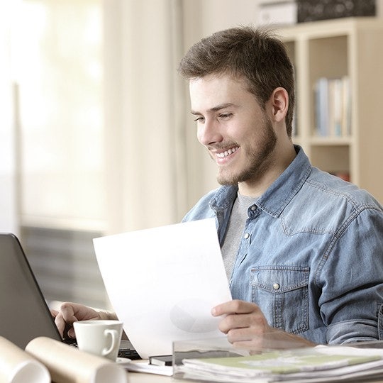 man working with a laptop