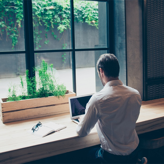 man working with a laptop