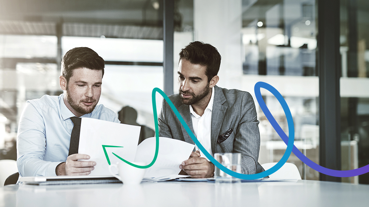 men looking to papers