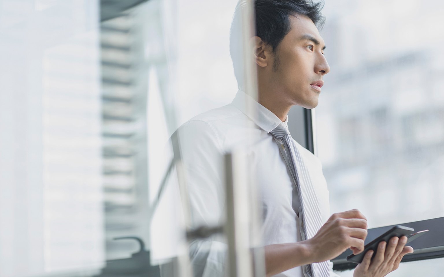 man looking into his phone