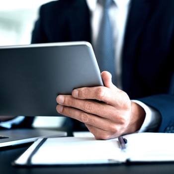 The importance of information security businessman using tablet