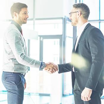 Your Standard Warranty businessmen shaking hands