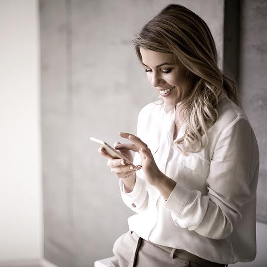 Related products woman looking to her phone