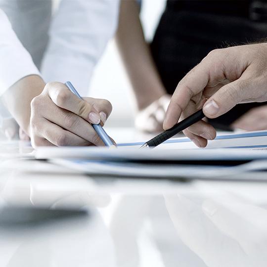 Kyocera enters Production Print people pointing papers