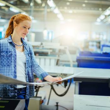 Let us show you a better way of printing Woman viewing the printed document