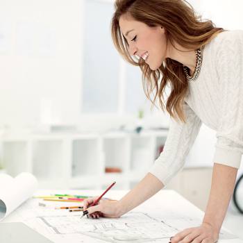 A sustainable solution for high-volume printing woman writing